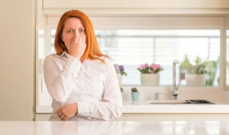 Why does my house smell like tar?